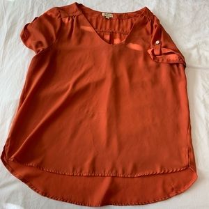 Orange blouse with button detail